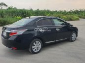 Cần bán Toyota Vios E năm 2014, màu đen số sàn