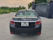 Cần bán Toyota Vios E năm 2014, màu đen số sàn