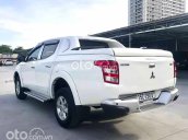 Cần bán Mitsubishi Triton 4x2AT đời 2016, màu trắng, nhập khẩu còn mới