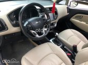 Cần bán Kia Rio sản xuất 2014, màu trắng, xe nhập