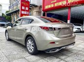 Xe Mazda 3 1.5 AT sản xuất năm 2016, màu nâu vàng