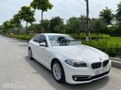 Bán chiếc BMW 520i sx 2014 trắng nội thất kem