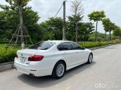 Bán chiếc BMW 520i sx 2014 trắng nội thất kem