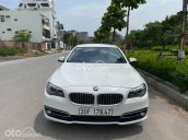 Bán chiếc BMW 520i sx 2014 trắng nội thất kem