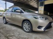 Cần bán lại xe Toyota Vios sx 2015 đk 2016 màu vàng cát số sàn, giá tốt