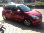 Cần bán lại xe Suzuki Swift sản xuất năm 2014, màu đỏ, giá tốt