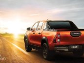 Bán ô tô Toyota Hilux 2.4L 4X2 MT đời 2021, màu cam