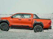 Bán ô tô Toyota Hilux 2.4L 4X2 MT đời 2021, màu cam