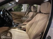 Bán BMW 320i SX năm 2014, màu trắng giá 790tr