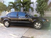 Cần bán lại xe Daewoo Magnus 2005, màu đen còn mới