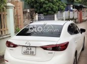 Cần bán gấp Mazda 3 sx 2015 màu trắng, giá ưu đãi