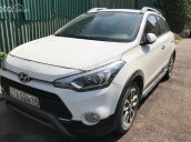 Cần bán Hyundai i20 Active 1.4AT sản xuất 2015, màu trắng, nhập khẩu còn mới, giá chỉ 450 triệu