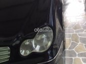 Bán xe Mercedes C180 sản xuất 2002, màu đen còn mới, giá 110tr