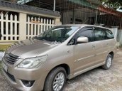 Bán xe Toyota Innova 2.0E đời 2013, màu vàng xe gia đình