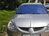 Bán ô tô Mitsubishi Lancer Gala GLX 1.6AT 2005, màu vàng 