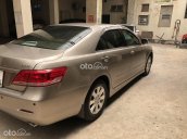 Cần bán Toyota Camry đời 2008, màu vàng cát, còn mới, chủ xe đi rất giữ gìn