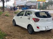 Cần bán gấp Hyundai Grand i10 năm sản xuất 2014, màu trắng xe gia đình