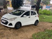 Cần bán gấp Hyundai Grand i10 năm sản xuất 2014, màu trắng xe gia đình