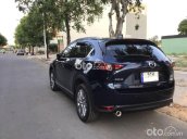 Bán Mazda CX 5 Deluxe 2.0 năm sản xuất 2021, màu đen xe gia đình