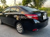 Cần bán gấp Toyota Vios sản xuất 2017, màu đen số sàn