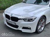 Cần bán xe BMW 320i năm 2013, màu trắng, 899 triệu