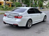 Cần bán xe BMW 320i năm 2013, màu trắng, 899 triệu