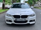 Cần bán xe BMW 320i năm 2013, màu trắng, 899 triệu