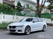 Cần bán xe BMW 320i năm 2013, màu trắng, 899 triệu