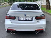 Cần bán xe BMW 320i năm 2013, màu trắng, 899 triệu