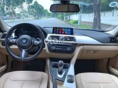 Cần bán xe BMW 320i năm 2013, màu trắng, 899 triệu