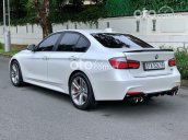 Cần bán xe BMW 320i năm 2013, màu trắng, 899 triệu