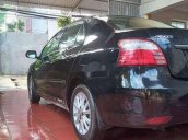 Cần bán lại xe Toyota Vios đời 2011, màu đen xe gia đình