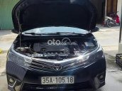 Cần bán xe Toyota Corolla Altis 1.8G MT sản xuất 2015, màu đen giá cạnh tranh