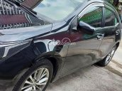 Cần bán xe Toyota Corolla Altis 1.8G MT sản xuất 2015, màu đen giá cạnh tranh