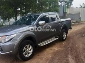 Xe Mitsubishi Triton 4x2 AT sản xuất năm 2016, màu xám, xe nhập ít sử dụng