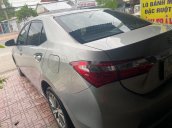 Cần bán Toyota Corolla Altis đời 2015, màu bạc như mới