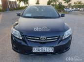 Bán ô tô Toyota Corolla Altis 1.8G MT đời 2009, màu đen còn mới