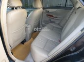 Bán ô tô Toyota Corolla Altis 1.8G MT đời 2009, màu đen còn mới