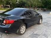 Cần bán lại xe Toyota Corolla Altis năm 2010 - màu đen còn rất mới