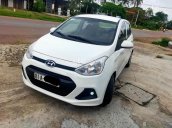 Cần bán lại xe Hyundai Grand i10 sản xuất năm 2015, màu trắng, nhập khẩu  