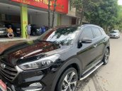 Cần bán xe Hyundai Tucson đời 2019, màu đen còn mới  