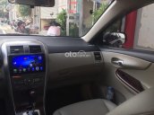 Cần bán xe Toyota Corolla Altis 2.0 V sản xuất 2011, màu đen xe gia đình