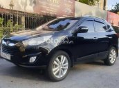 Cần bán Hyundai Tucson 2.0 AT 4WD năm sản xuất 2012, màu đen, nhập khẩu nguyên chiếc còn mới