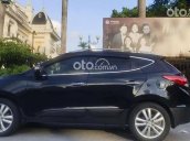 Cần bán Hyundai Tucson 2.0 AT 4WD năm sản xuất 2012, màu đen, nhập khẩu nguyên chiếc còn mới