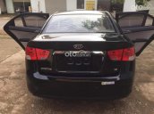 Cần bán Kia Forte 1.6 MT 2010, màu đen, xe nhập còn mới