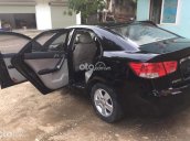 Cần bán Kia Forte 1.6 MT 2010, màu đen, xe nhập còn mới