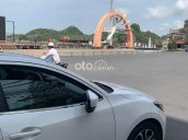 Cần bán xe Mazda 2 1.5 AT đời 2016, màu trắng, giá tốt