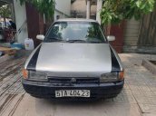 Cần bán lại xe Mazda 323 đời 1995, hai màu trắng xám