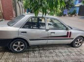 Cần bán lại xe Mazda 323 đời 1995, hai màu trắng xám