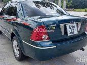 Cần bán gấp Ford Laser GHIA 1.8 MT năm sản xuất 2004, màu xanh lam xe gia đình